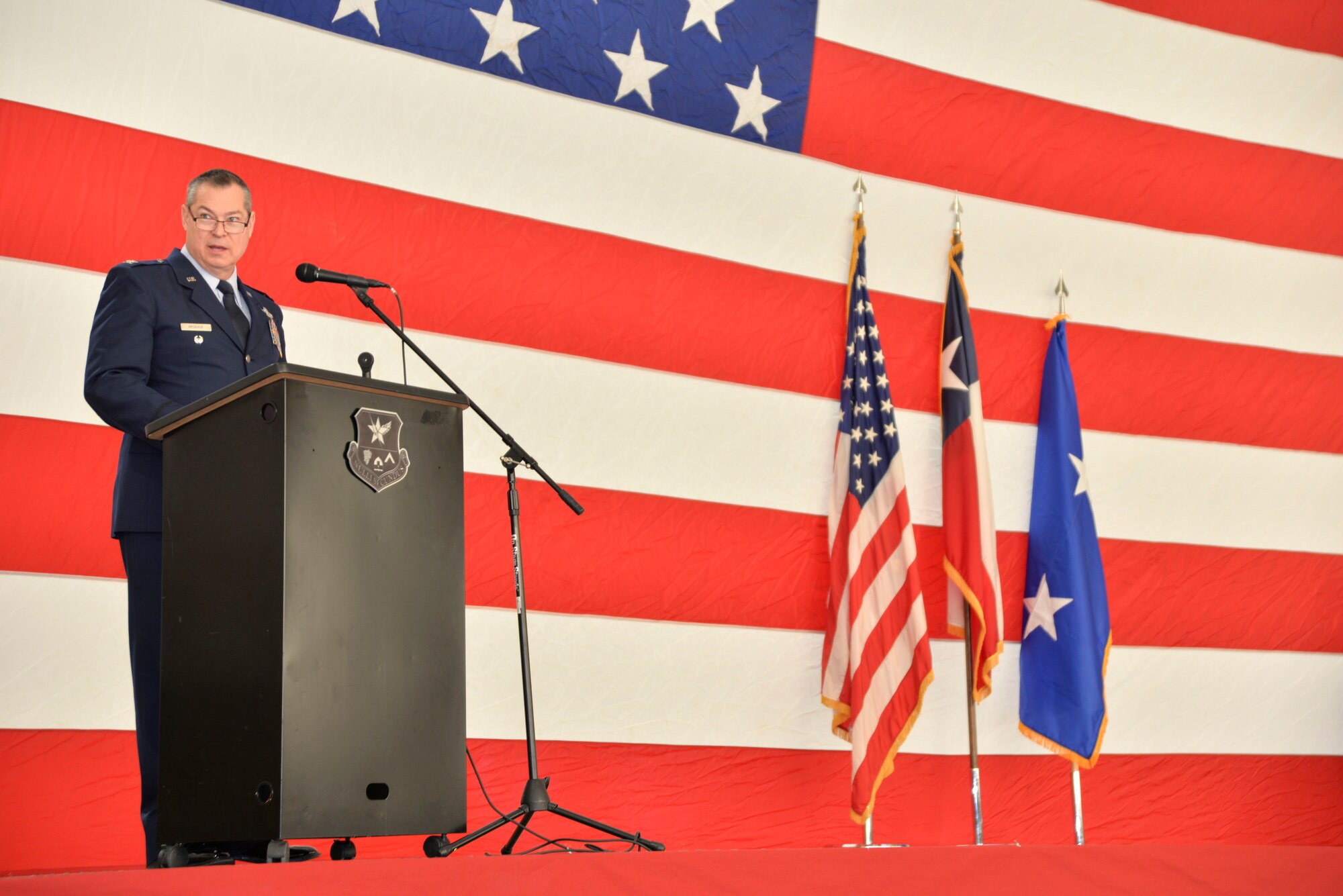 Col. Christopher McGraw addresses friends, family and 136th Airlift Wing members minutes after assuming command of the unit during a change of command ceremony here January 26, 2019. McGraw returned to the 136 AW since previously serving from March 2001 to March 2017.