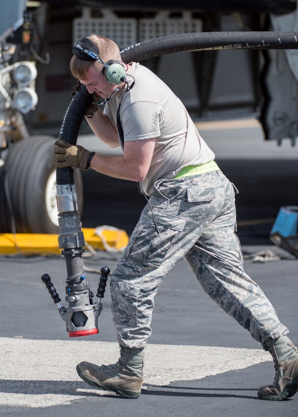 Staff Sgt. Shaun Tant, 509th Logistics Readiness Squadron fuel distribution operator deployed from Whiteman Air Force Base, Missouri, conducts a hot-pit refueling on a B-2 Spirit Bomber at Joint Base Pearl Harbor-Hickam, Hawaii Jan. 22, 2018