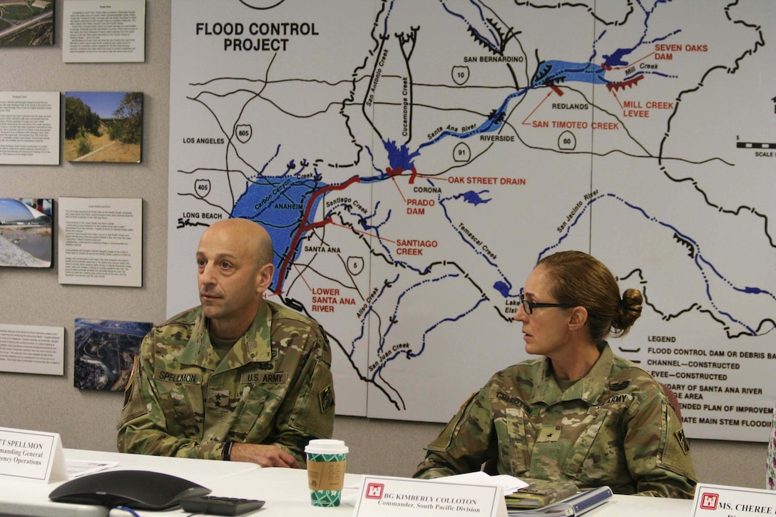 Maj. Gen. Scott Spellmon, U.S. Army Corps of Engineers deputy commanding general for Civil and Emergency Operations, left, and Brig. Gen. Kim Colloton, the Corps’ South Pacific Division commander, right, listen to a brief about the Santa Ana River Mainstem project during a Jan. 9 tour of the Prado Dam basin.