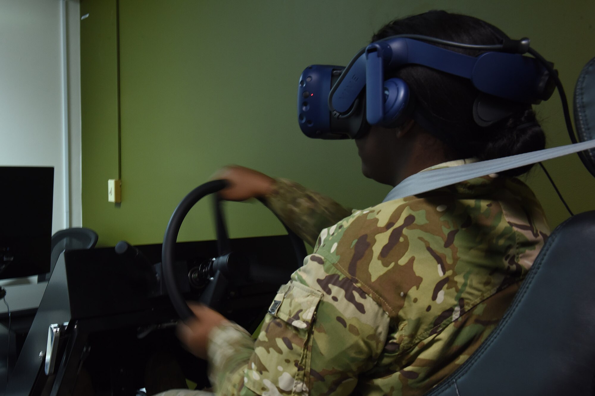 Senior Airman Ebony Robinson, 841st Missile Security Forces Squadron missile security operator, puts on gear for a vehicle simulator Jan. 28, 2019, 2019, at Malmstrom Air Force Base, Mont.