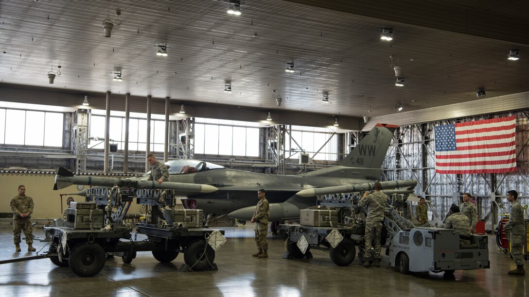 Misawa Airmen with the 13th and 14th Aircraft Maintenance Unit inspect inert munitions during the fourth quarter weapons load competition at Misawa Air Base, Japan, Jan. 18, 2019. Expert weapons technicians evaluate participants on various aspects such as safety, accuracy, tool accountability and dress and appearance. Together, both AMU’s contribute to the mission by supporting the U.S. and its allies in the Indo-Pacific region. (U.S. Air Force photo by Airman 1st Class Collette Brooks)