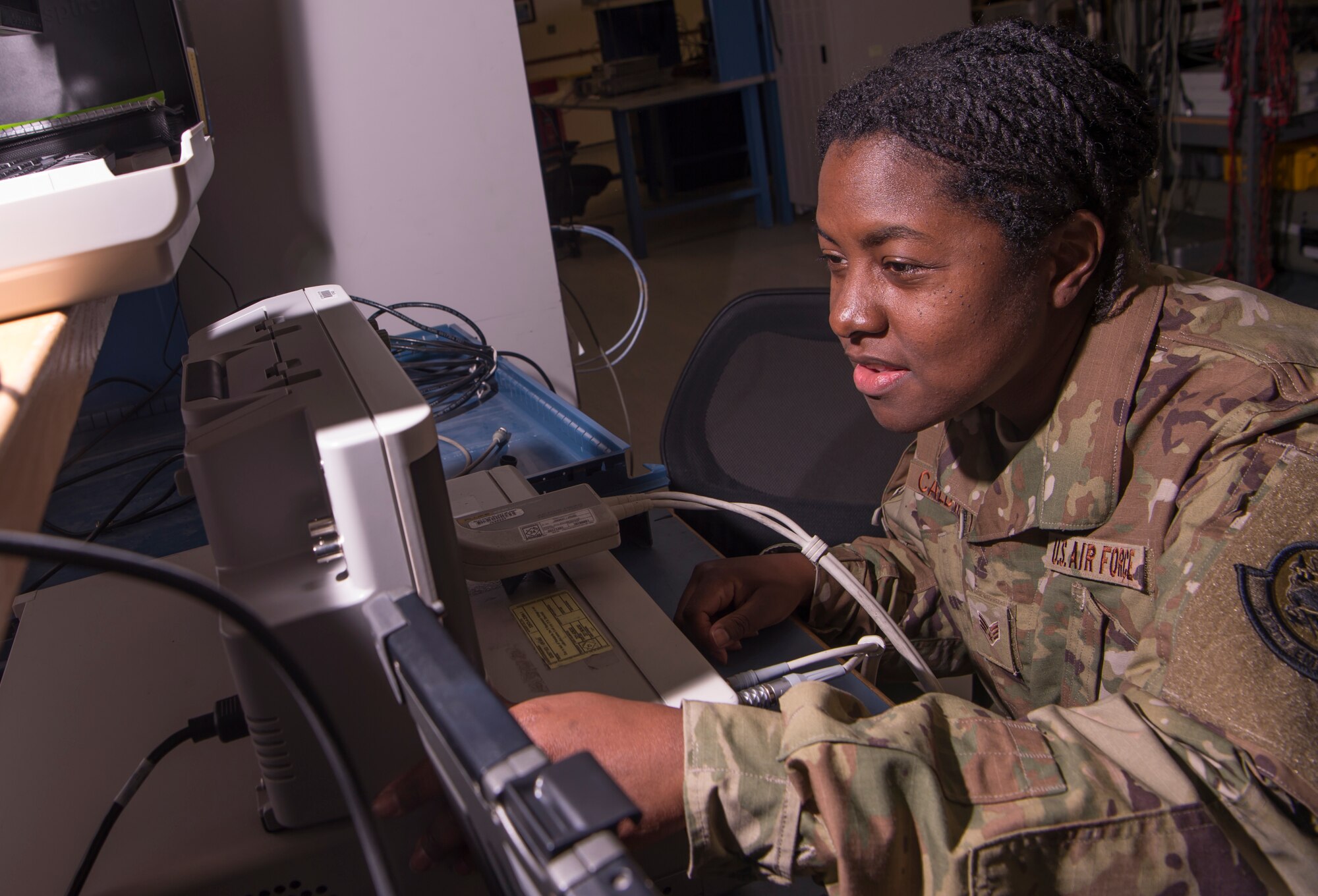 Senior Airman Janae Caldwell, 379th Expeditionary Maintenance Squadron (EMXS) precision measurement equipment laboratory (PMEL) test, measurement and diagnostic equipment (TMDE) technician, calibrates a piece of equipment with an oscilloscope Jan. 25, 2019, at Al Udeid Air Base, Qatar. The team supports approximately 14,000 pieces of TMDE and can forward deploy to locations throughout U.S. Air Forces Central Command to provide precise calibration for equipment that can’t be transported to Al Udeid. (U.S. Air Force Tech. Sgt. Christopher Hubenthal)