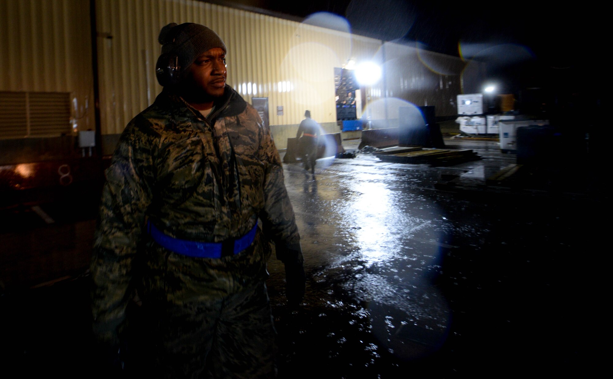Airman 1st Class Andrew Winters, 375th Logistics Readiness Squadron air transportation specialist, waits for a forklift to move pallets during a mobility exercise on Scott Air Force Base, Illinois, Jan. 23, 2019. Winters, with a team of two other Airmen, were tasked will palletizing personal and individual protective equipment gear from the Airmen participating in the exercise.