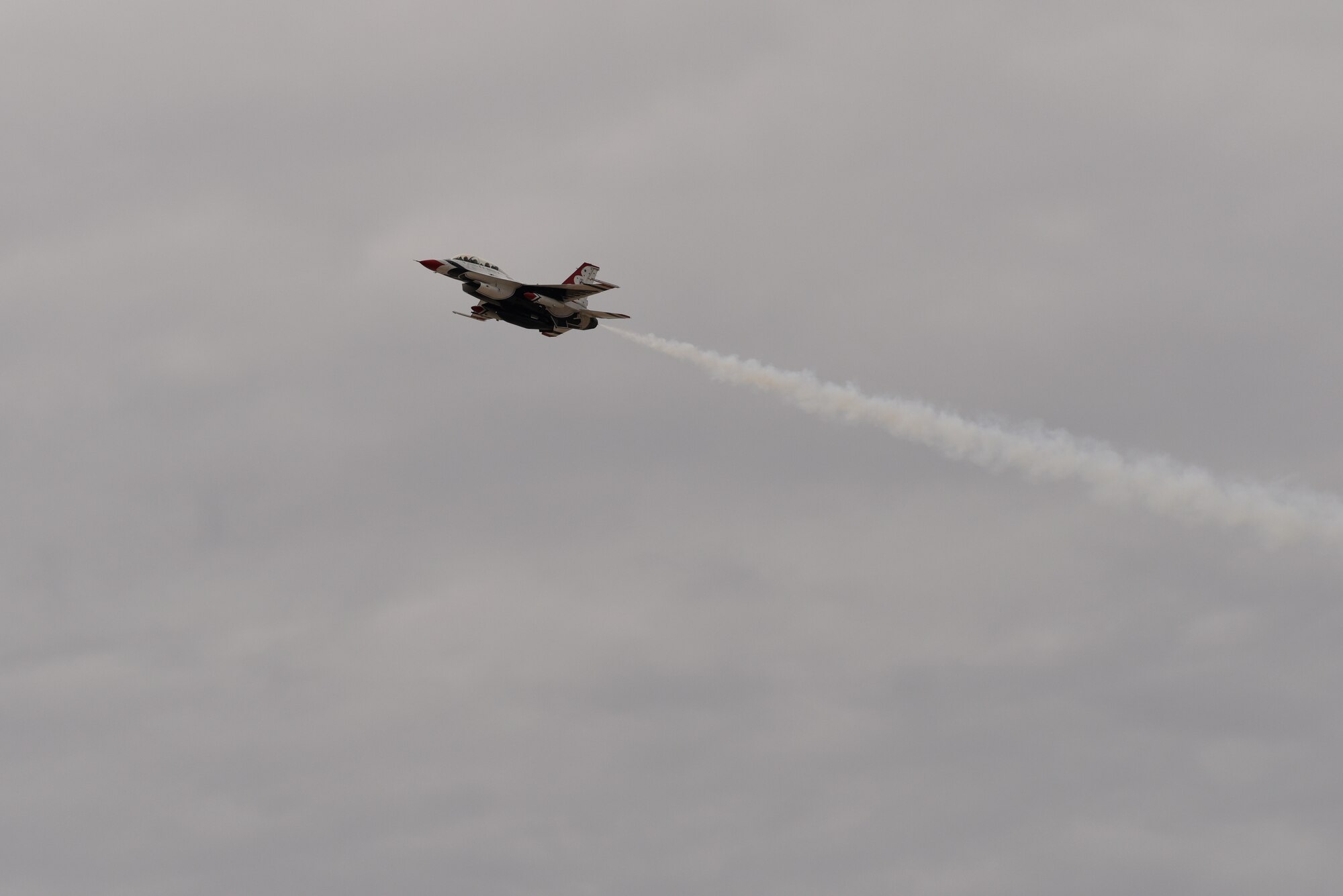 U.S. Air Force Thunderbird No. 8 flies over Kirtland Air Force Base, N.M., Jan. 29, 2019. The Thunderbirds are scheduled to perform at the Kirtland Air and Space Fiesta this summer. (U.S. Air Force photo by Senior Airman Eli Chevalier)