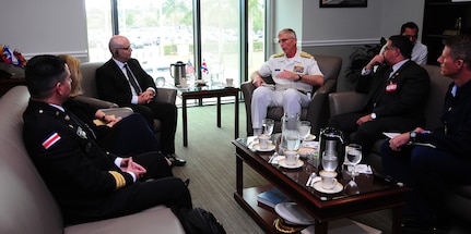 The commander of U.S. Southern Command, Navy Adm. Craig Faller, talks with Costa Rica's Minister of Public Security Michael Soto Rojas at SOUTHCOM headquarters.