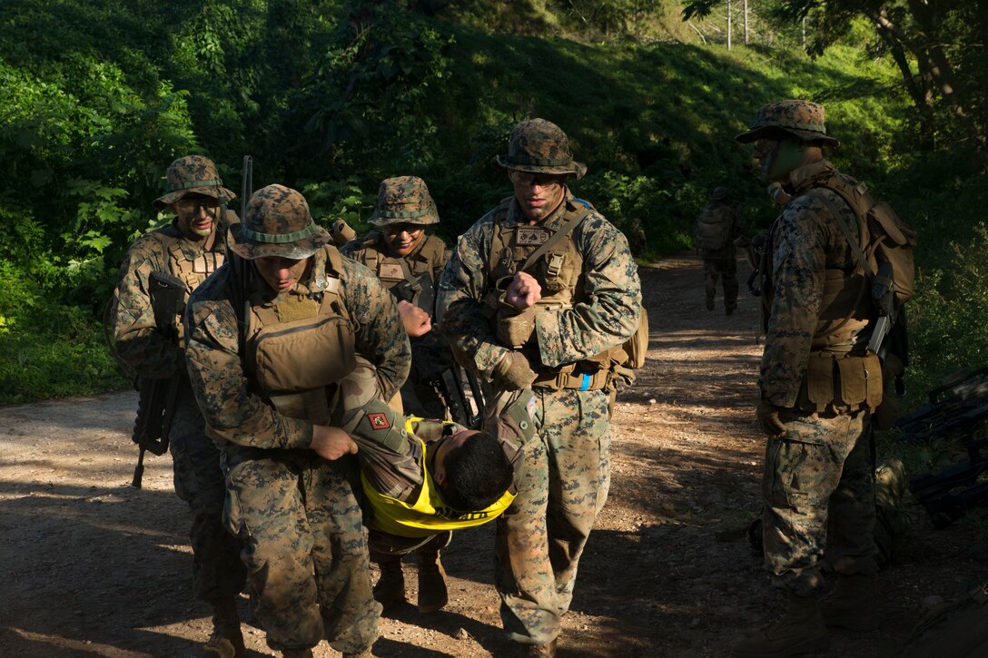U.S. Marines with Task Force Koa Moana carry a simulated casualty during an exercise on Moorea, French Polynesia, Oct. 3, 2018.