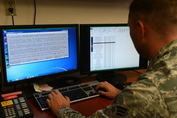An Airman at Luke Air Force Base, Arizona, works on the Interim Work Information Management System, which was widely used by base civil engineers across the Air Force to track man hours, request parts and build maintenance schedules. The system is in the process of being replaced by NexGen IT. (U.S. Air Force photo by Senior Airman James Hensley)