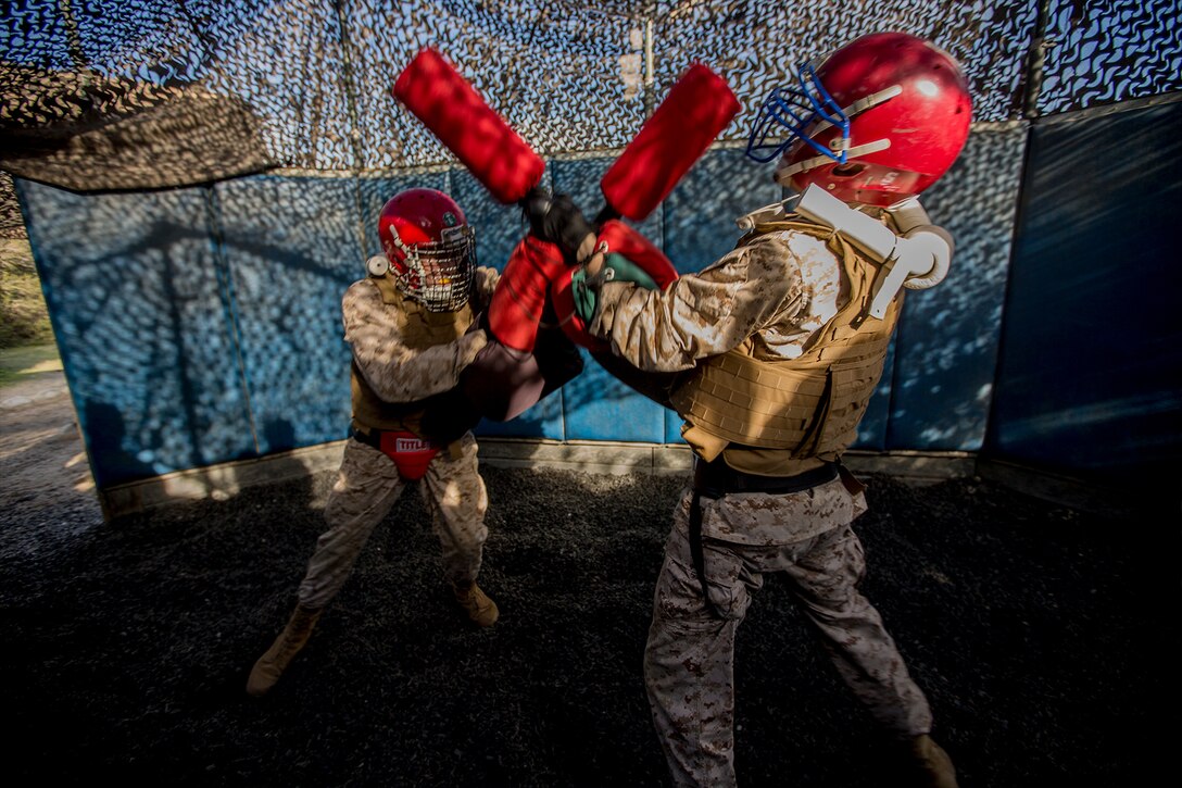 Marine Corps recruits compete against one another in a martial arts event.