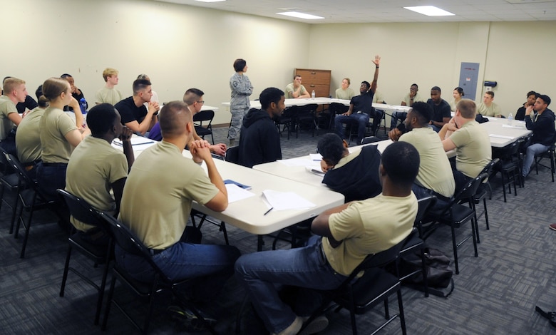Master Sgt. Charity Roush, 403rd Wing Development and Training Flight chief, talks with new Reserve Delayed Enlistement Program trainees during the 403rd WG Unit Training Assembly weekend Jan. 11, 2019. The Reserve D&TF helps prepare new recruits for the physical and mental challenges of Basic Military Training (U.S. Air Force photo by Tech. Sgt. Sarah Loicano)