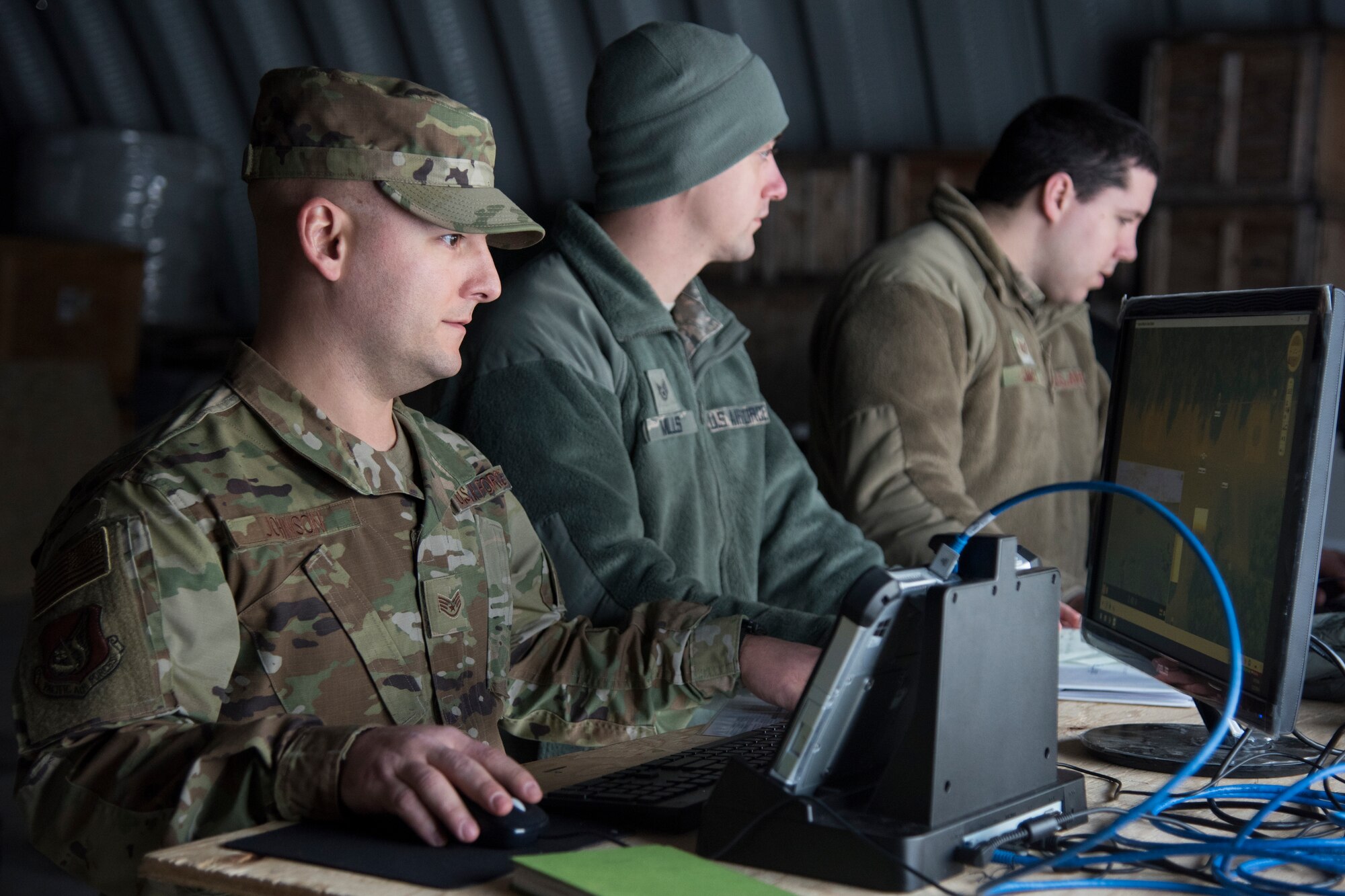 U.S. Air Force Staff Sgt. Jesse Johnson, 673d Civil Engineer Squadron construction manager, operates a Small Unmanned Aircraft System during a newly adopted Rapid Airfield Damage Assessment System training course at Joint Base Elmendorf-Richardson, Alaska, Jan. 23, 2019. Throughout the first week of training Airmen focused on learning to fly the SUAS. During the second week they learned to fly the RADAS mission while using the new system.