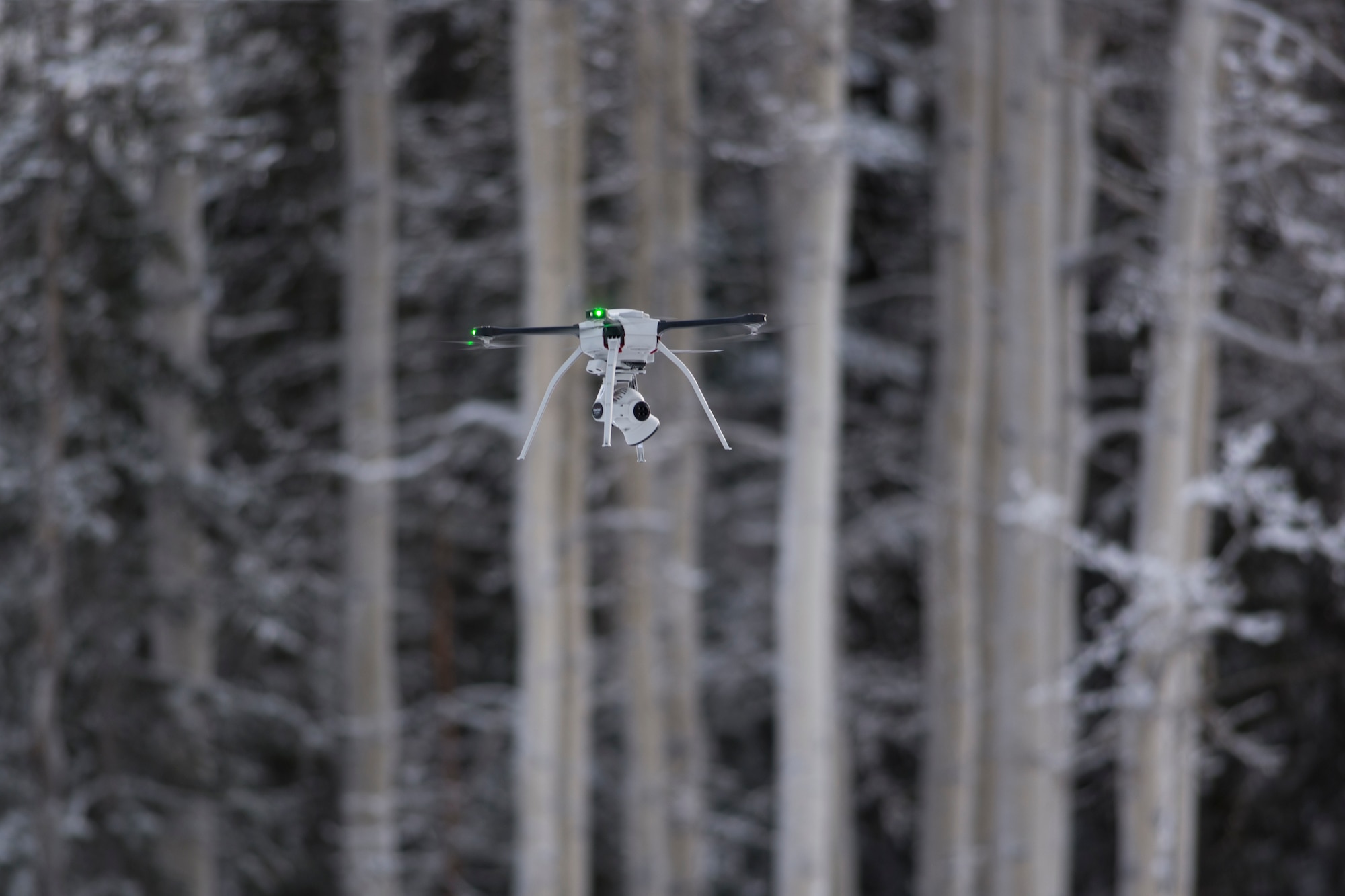 U.S. Air Force civil engineers fly a Small Unmanned Aircraft System during a newly adopted Rapid Airfield Damage Assessment System training course at Joint Base Elmendorf-Richardson, Alaska, Jan. 23, 2019. Throughout the first week of training, Airmen focused on learning to fly the SUAS. During the second week they learned to fly the RADAS mission while using the SUAS systems.