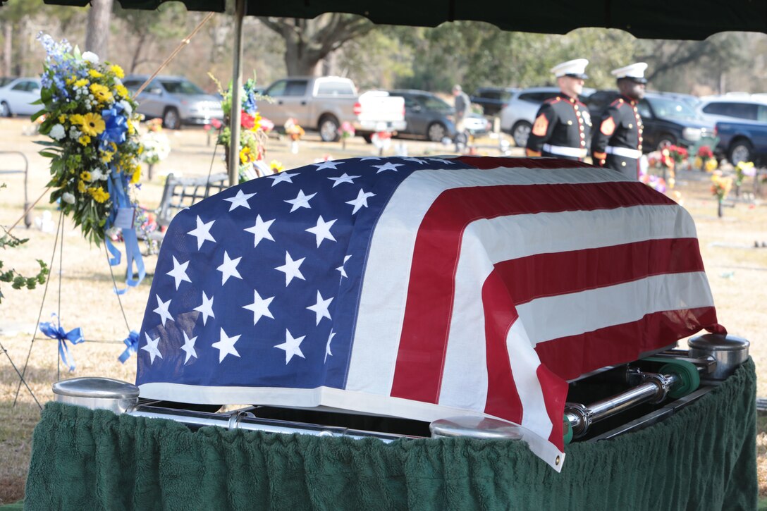 Marines and civilian-Marines aboard Marine Corps Logistics Base Albany paid their respects to Master Gunnery Sgt. William A. Hamby, (USMC ret.), who was laid to rest at Crown Hill Cemetery, in Albany, Ga., Jan. 30. Hamby volunteered for military service with the U.S. Marine Corps in October 1945, and was honorably retired in July 1969 at the service's highest enlisted rank -- E9. Hamby served with distinction during WWII, the Korean War, and the Vietnam War. In North Korea, he was one of the "Chosin Few" and was awarded the Purple Heart along with several other medals and commendations. Throughout his time in the Marine Corps, Hamby served in four of the six Marine Divisions. Toward the end of his military career, he transferred from Okinawa, Japan, to Albany, Ga,, where he was one of the first to work on the development of the Marine Corps Logistics Base Albany. (U.S. Marine Corps photo by Re-Essa Buckels)