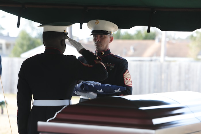 Marines and civilian-Marines aboard Marine Corps Logistics Base Albany paid their respects to Master Gunnery Sgt. William A. Hamby, (USMC ret.), who was laid to rest at Crown Hill Cemetery, in Albany, Ga., Jan. 30. Hamby volunteered for military service with the U.S. Marine Corps in October 1945, and was honorably retired in July 1969 at the service's highest enlisted rank -- E9. Hamby served with distinction during WWII, the Korean War, and the Vietnam War. In North Korea, he was one of the "Chosin Few" and was awarded the Purple Heart along with several other medals and commendations. Throughout his time in the Marine Corps, Hamby served in four of the six Marine Divisions. Toward the end of his military career, he transferred from Okinawa, Japan, to Albany, Ga,, where he was one of the first to work on the development of the Marine Corps Logistics Base Albany. (U.S. Marine Corps photo by Re-Essa Buckels)