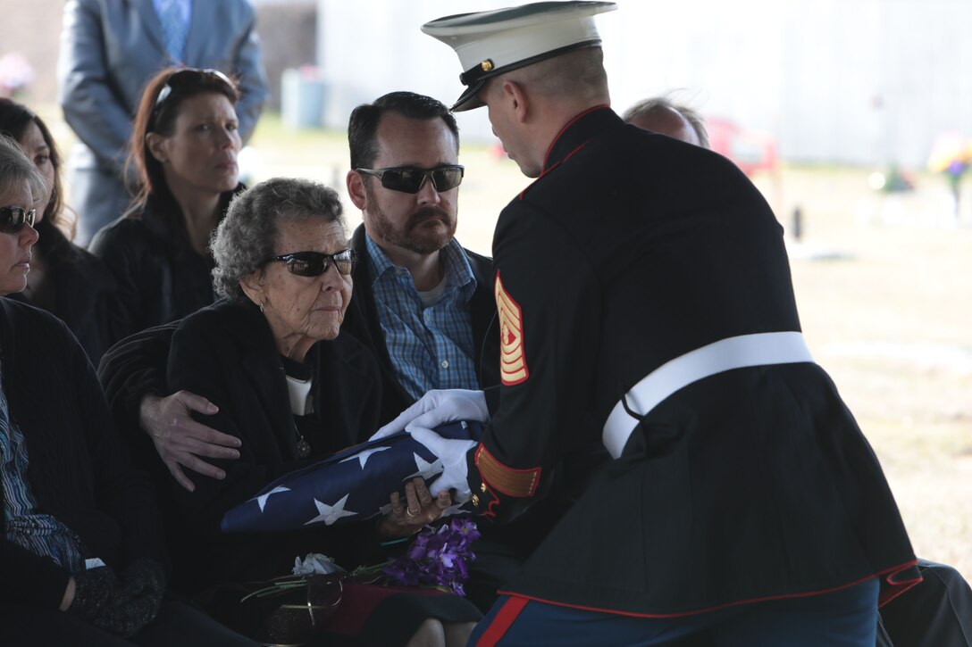 Marines and civilian-Marines aboard Marine Corps Logistics Base Albany paid their respects to Master Gunnery Sgt. William A. Hamby, (USMC ret.), who was laid to rest at Crown Hill Cemetery, in Albany, Ga., Jan. 30. Hamby volunteered for military service with the U.S. Marine Corps in October 1945, and was honorably retired in July 1969 at the service's highest enlisted rank -- E9. Hamby served with distinction during WWII, the Korean War, and the Vietnam War. In North Korea, he was one of the "Chosin Few" and was awarded the Purple Heart along with several other medals and commendations. Throughout his time in the Marine Corps, Hamby served in four of the six Marine Divisions. Toward the end of his military career, he transferred from Okinawa, Japan, to Albany, Ga,, where he was one of the first to work on the development of the Marine Corps Logistics Base Albany. (U.S. Marine Corps photo by Re-Essa Buckels)