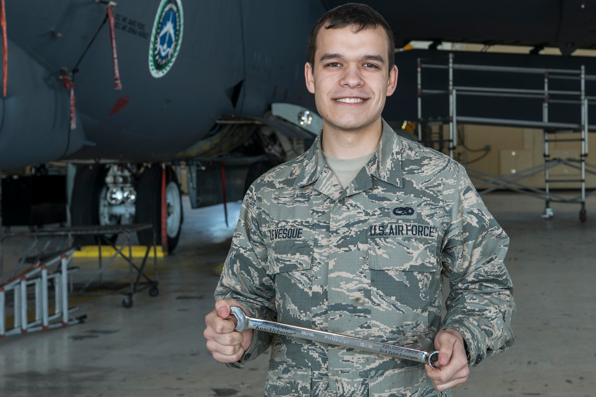U.S. Air Force Senior Airman Tyler Levesque received the “Knuckle Buster” award on Jan. 25, 2019, Barksdale Air Force Base, Louisiana. Levesque is assigned to the 2nd Maintenance Squadron and received the award for discovering that two control cables (the Lateral Control cable and the Drag Chute cable) on a B-52H Stratofortress were improperly routed. His perserverance in ensuring the cables were correctly configured displayed his professionalism and dedication.  Levesque works with the 307th MXS as part of the Total Force Enterprise.  (U.S. Air Force photo by Greg Steele)