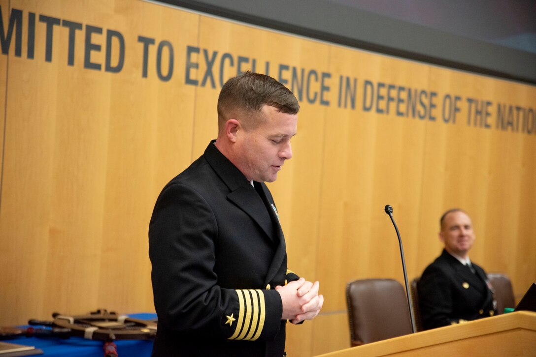 Incoming Defense Intelligence Agency Navy Element Commander Capt. Peter N. Shepard speaks to his new command during a change of command ceremony, Jan. 30, at the DIA headquarters on Joint Base Anacostia-Bolling. Shepard most recently served as the director of intelligence for U.S. Third Fleet and Deputy Maritime Operations Center director in San Diego.