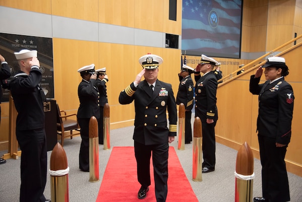 Capt. Peter N. Shepard is piped ashore after becoming the new commander of Defense Intelligence Agency Navy Element during a change of command ceremony, Jan. 30, at the DIA headquarters on Joint Base Anacostia-Bolling.