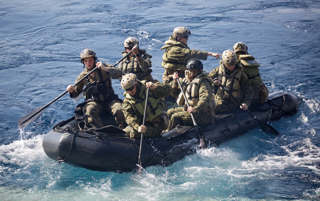 Marines with Alpha Company, Battalion Landing Team, 1st Battalion, 4th Marines, the “China Marines,” pilot a Combat Rubber Raiding Craft during a simulated boat raid, Philippine Sea, Jan. 25, 2019. Alpha Company Marines are the small boat raid specialists for BLT 1/4, the Ground Combat Element for the 31st Marine Expeditionary Unit. The 31st MEU, the Marine Corps’ only continuously forward-deployed MEU partnering with the Wasp Amphibious Ready Group, provides a flexible and lethal force ready to perform a wide range of military operations as the premier crisis response force in the Indo-Pacific region. (Official Marine Corps photo by Lance Cpl. Harrison C. Rakhshani/Released)