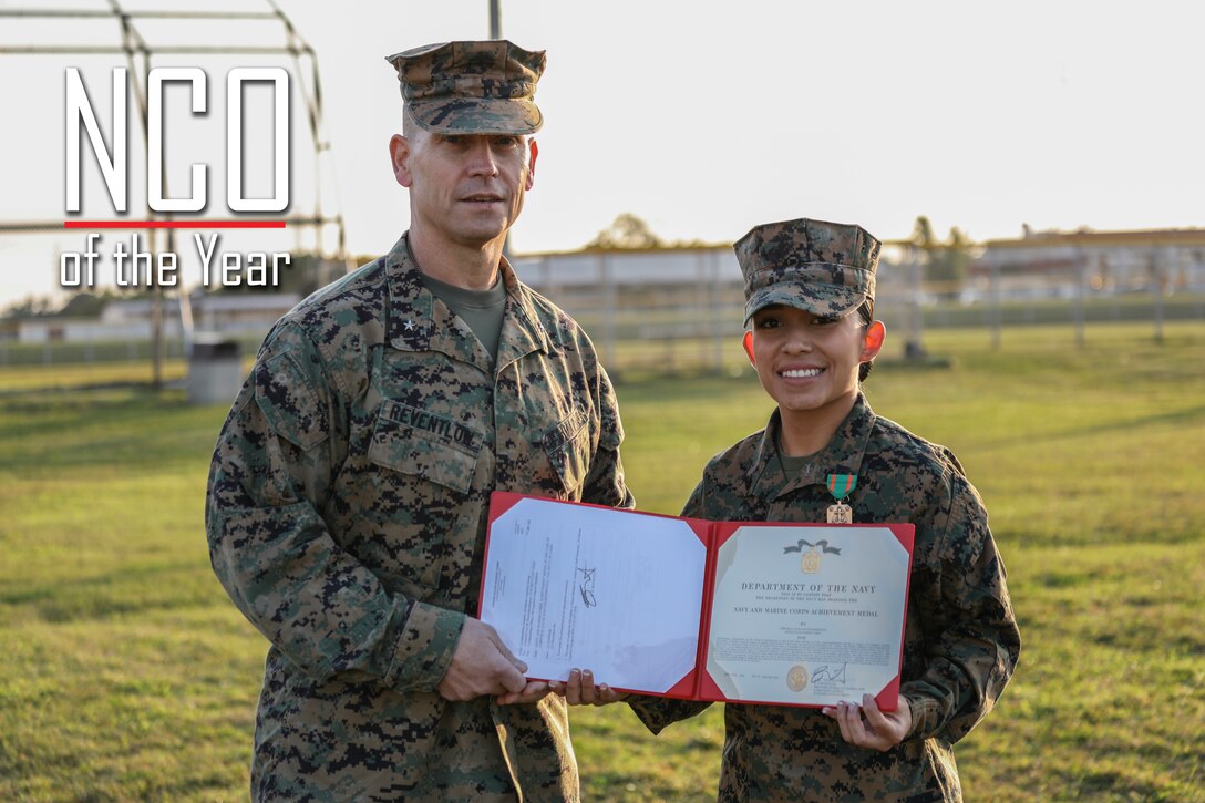 Cpl. Luz Sauceda, right, receives the Navy and Marine Corps Achievement Medal from Brig. Gen. Keith D. Reventlow, left, on Camp Hansen, Okinawa, Japan, Jan. 24, 2019. Sauceda received the medal for being named 3rd Marine Logistics Group Non-Commissioned Officer of the Year. Reventlow, a native of Newtown, Connecticut, is the commanding general of 3rd Marine Logistics Group. Sauceda, a native of Orange, Texas, is a bulk fuel specialist with Headquarters and Service Company, 9th Engineer Support Battalion, 3rd MLG. (U.S. Marine Corps photo by Lance Cpl. Armando Elizalde)