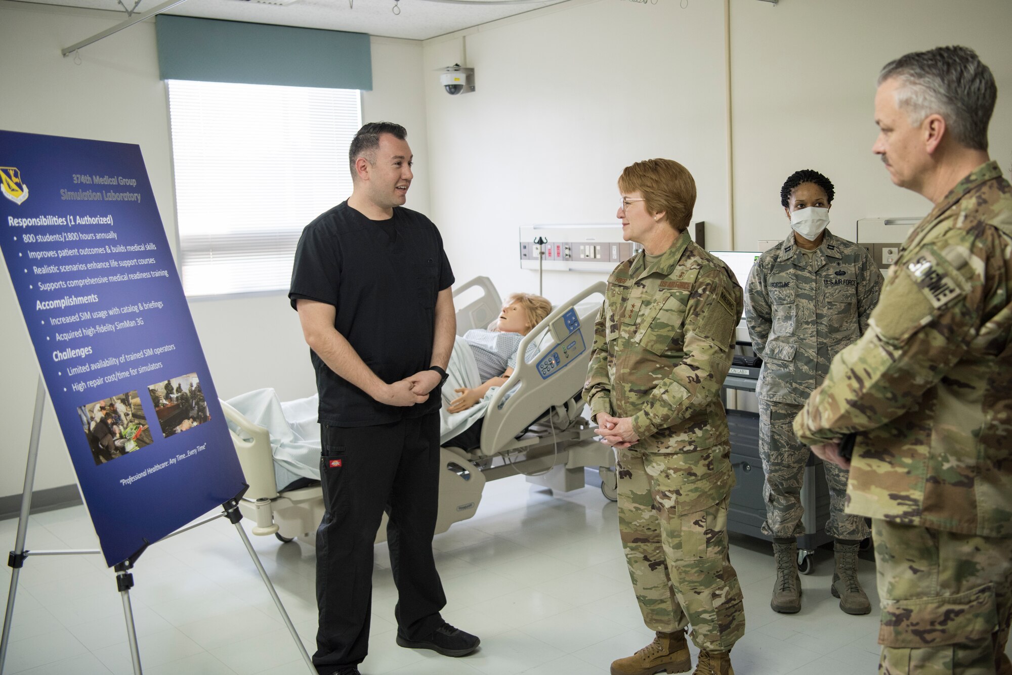 Lt. Gen. Dorothy Hogg, 23rd U.S. Air Force Surgeon General, and, Chief Master Sgt. G. Steve Cum, Chief of the Medical Enlisted Force meet with members of the 374th Medical Group Simulation Laboratory, Jan. 29, 2019, at Yokota Air Base, Japan.