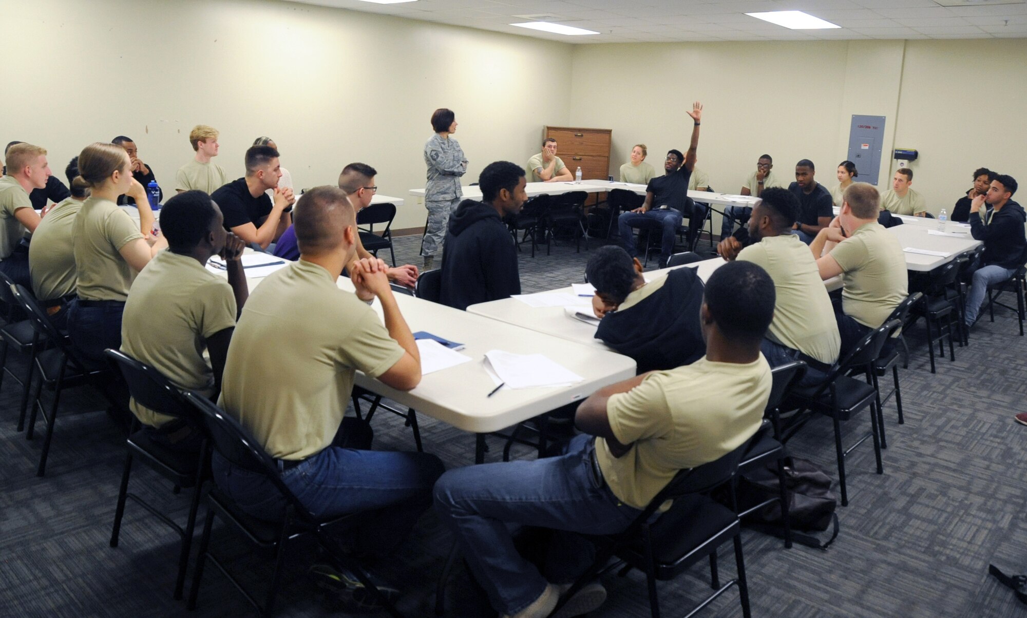 Master Sgt. Charity Roush, 403rd Wing Development and Training Flight chief, talks with new Reserve Delayed Enlistement Program trainees during the 403rd WG Unit Training Assembly weekend Jan. 11, 2019. The Reserve D&TF helps prepare new recruits for the physical and mental challenges of Basic Military Training (U.S. Air Force photo by Tech. Sgt. Sarah Loicano)