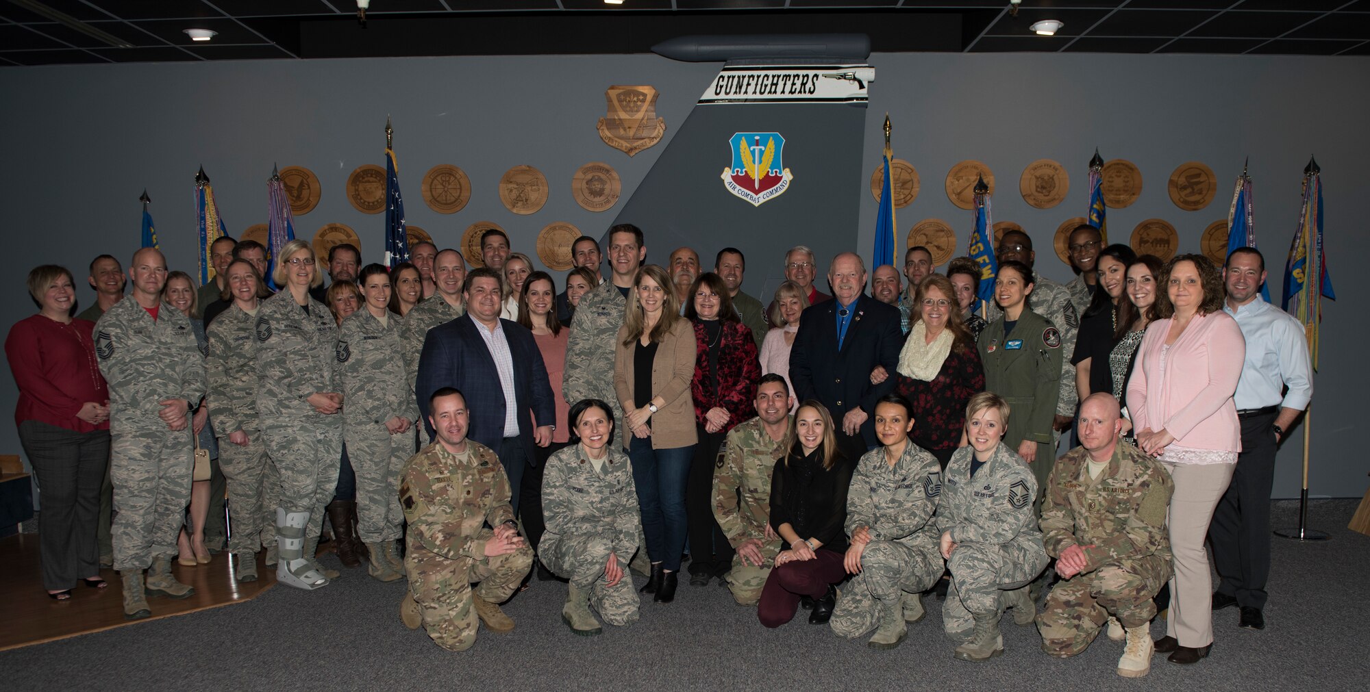 Image of Squadron commanders pose with newly inducted honorary commanders, Jan. 25, 2019, at Mountain Home Air Force Base, Idaho. The intent of the program is to educate local community members about the base and it's mission. (U.S. Air Force photo by Senior Airman Alaysia Berry)