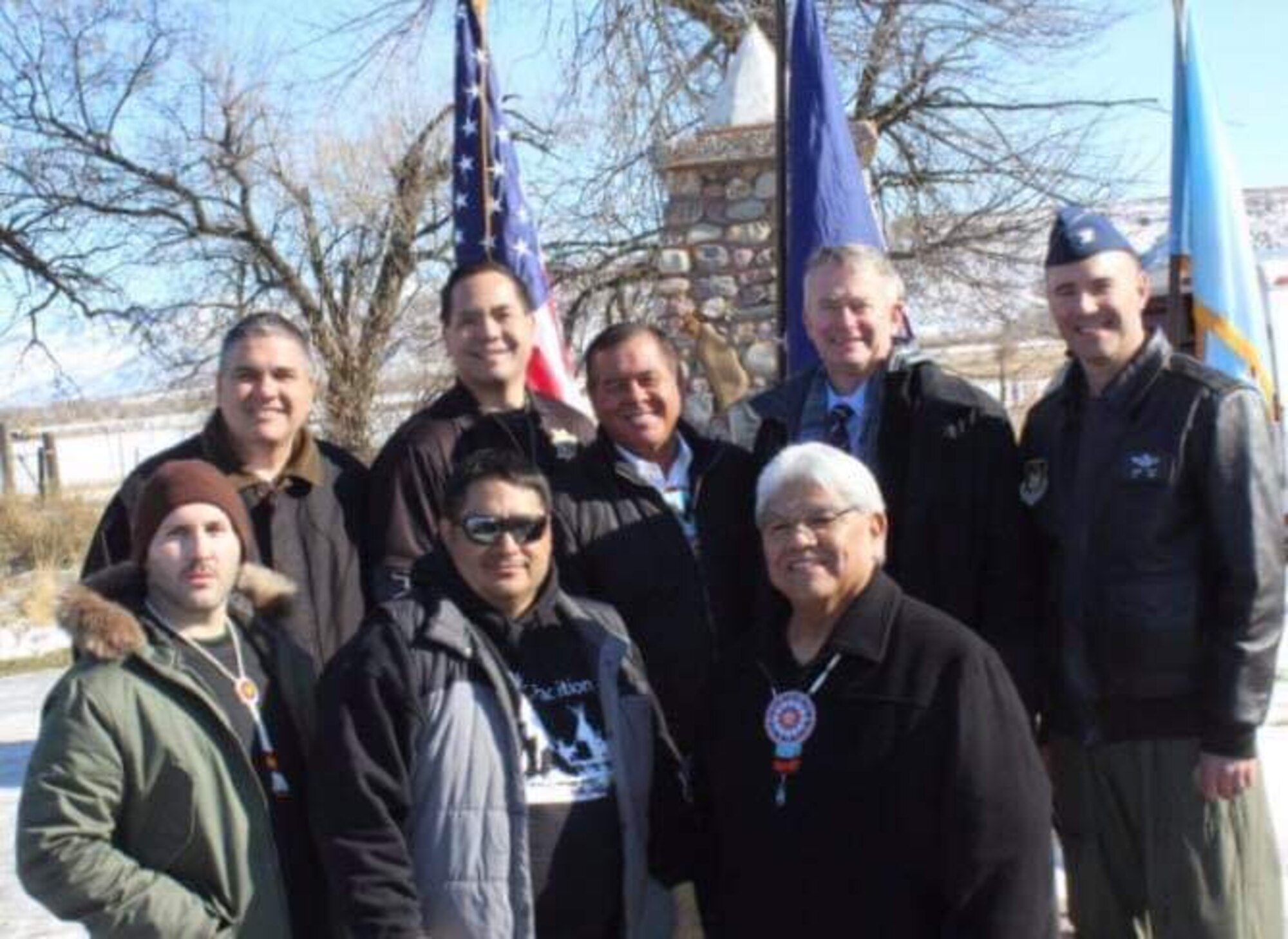 Col. Aaron Blum, 75th Air Base Wing, represents Hill Air Force Base at the memorial ceremony hosted by the Northwestern Band of the Shoshone Jan. 29 for the Bear River Massacre. The annual memorial was held northeast of Preston, Idaho at the site along the Bear River where more than 300 members of the Northwest Shoshone Tribe were killed in their winter camp on Jan. 29, 1863. The Bear River Massacre was the single greatest loss of Indian lives in American history. Idaho Governor Brad Little attended the memorial and made an official proclamation recognizing Jan. 29, 2019, as a day of remembrance to the Bear River Massacre. Pictured are, left to right, back row: Jeff Parry (Northwestern Band of the Shoshone), Utah Attorney General Sean Reyes, Darren Parry (Northwestern Band of the Shoshone Tribal Chairman), Idaho Governor Brad Little and Blum. Front row, left to right: Northwestern Band of the Shoshone Tribal Councilmen Michael Gross, Cale Worley and Dennis Alex. (Courtesy photo by Melody Parry, Northwestern Band of the Shoshone)