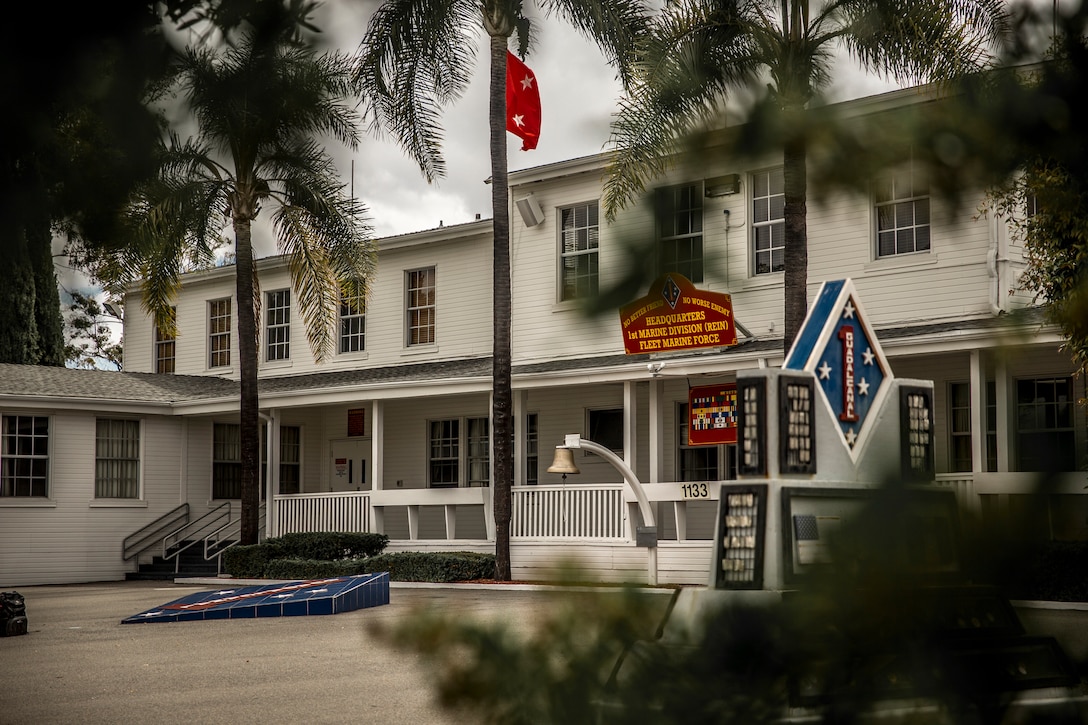 The photo depicts the 1st Marine Division Headquarters Building on Marine Corps Base Camp Pendleton, California, May 17, 2018.