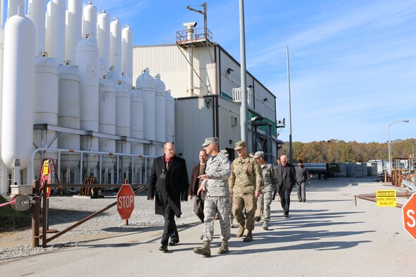 Brig. Gen. Christopher Azzano, commander of the Air Force Test Center, right, speaks with Lance Baxter, director of the AEDC Hypersonic Systems Combined Test Force, during a Nov. 16 tour of the Aerodynamic & Propulsion Test Unit. Azzano and other AFTC leadership visited Arnold Air Force Base in mid-November to take part in the 2018 AFTC Strategic Offsite, Azzano’s first offsite since assuming the role of AFTC commander in August. (U.S. Air Force photo by Brad Hicks) (This image was altered by obscuring badges for security purposes)