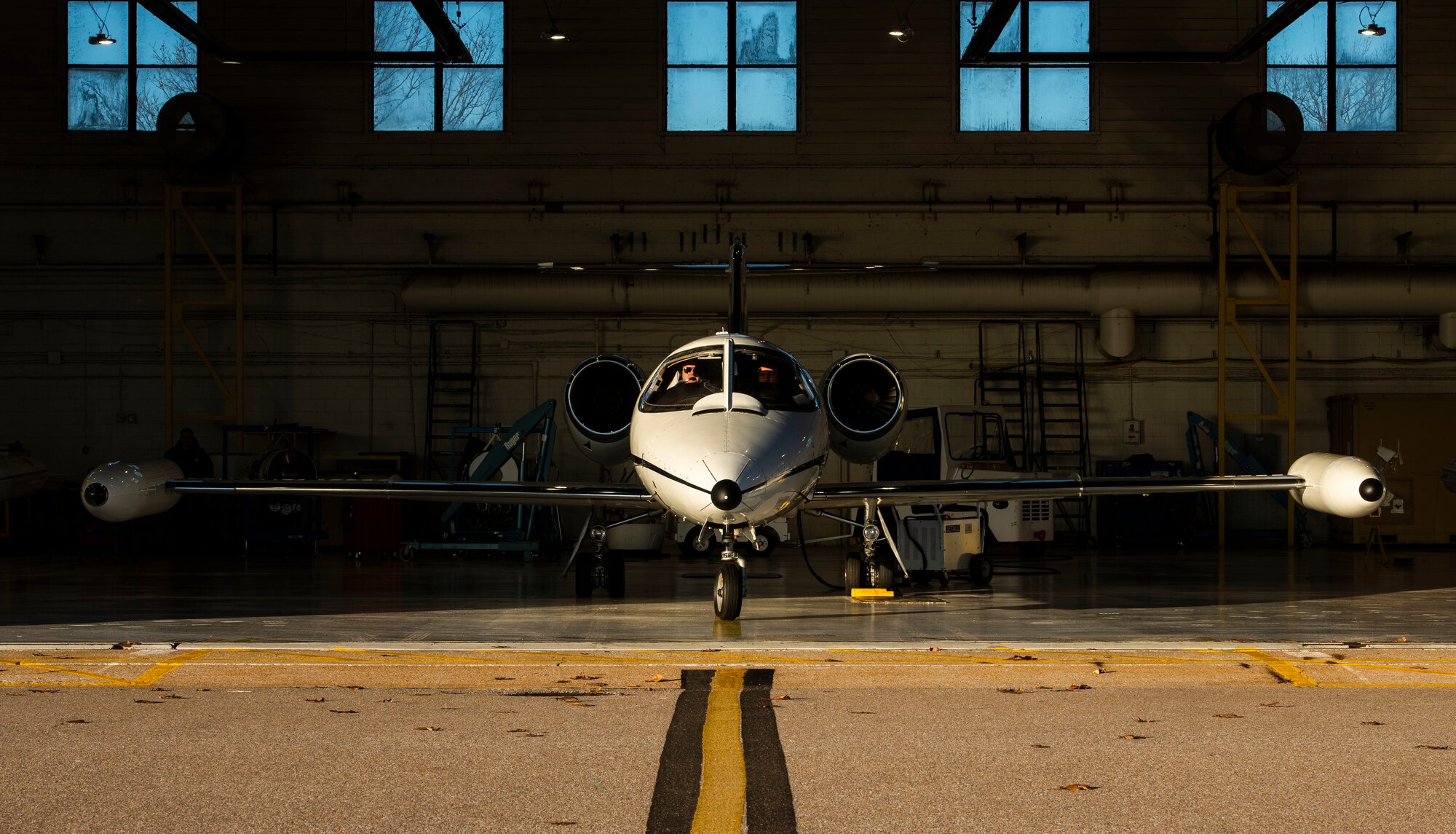 A C-21 aircraft awaits take off outside of a 458th Airlift Squadron hangar, before a training flight on Dec. 17, 2018 at Scott Air Force Base, Illinois. The 458th AS celebrates 35 years of C-21 operations at Scott AFB in 2019. A $38 million avionics upgrade for the fleet is underway and a consolidation effort is moving four aircraft from Andrews Air Force Base, Maryland, to join Scott’s 10 C-21s by late summer, bringing the total of 14 aircraft assigned here.