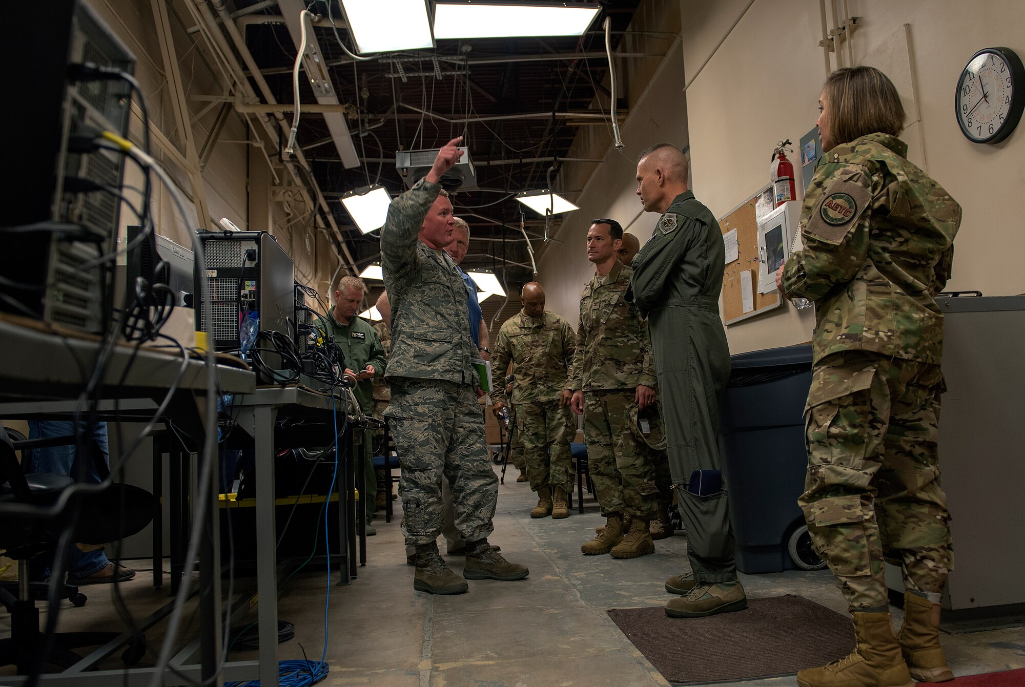 U.S. Air Force Lt. Col. Michael Lynch, 337th Air Control Squadron commander, center, explains damage sustained to a structure with leaders from Air Education and Training Command and the 33rd Fighter Wing about hurricane recovery progress Jan. 24, 2019, at Tyndall Air Force Base, Fla. The 337th ACS resumed classes and most of its support functions on January 7, just months after Hurricane Michael destroyed much of Tyndall. (U.S. Air Force photo by Staff Sgt. Peter Thompson)