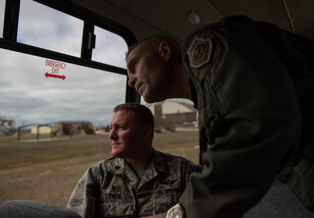 U.S. Air Force Lt. Gen. Steven Kwast, Air Education and Training Command commander, right, and Lt. Col. Michael Lynch, 337th Air Control Squadron commander, view damage on the flightline caused by Hurricane Michael Jan. 24, 2019, at Tyndall Air Force Base, Fla. The 337th ACS sustained damage to several structures during Hurricane Michael. (U.S. Air Force photo by Staff Sgt. Peter Thompson)