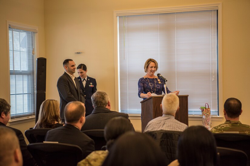 Kathy Edenborough, 628th Contracting Squadron director of business operations and 628th Air Base Wing small business specialist, delivers remarks at her retirement ceremony Jan. 30, 2019, at the Hunt Community Center on Joint Base Charleston, S.C.