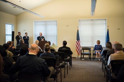 Col. Dale Skinner, Air Force Life Cycle Management Center deputy director of contracting, delivers remarks at Kathy Edenborough’s, retirement ceremony Jan. 30, 2019, at the Hunt Community Center on Joint Base Charleston, S.C.