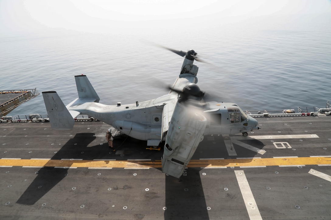 A MV-22 Osprey prepares to launch from the flight deck of the Wasp-class amphibious assault ship USS Kearsarge (LHD 3). Kearsarge is deployed to the U.S. 5th Fleet area of operations in support of naval operations to ensure maritime stability and security in the Central Region, connecting the Mediterranean and the Pacific through the western Indian Ocean and three strategic choke points. (U.S. Army photo by Sgt. Franklin Moore)