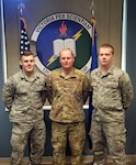 (Left to right) Airman 1st Class Garrett Starr, Iowa Air National Guard’s 132nd Operations Group, Master Sgt. J. Garrett Palmer, Florida ANG’s 131st Training Flight, and Airman 1st Class Phillip Turney, Texas ANG’s 209th Weather Flight, pose for a picture after winning the Thor’s Legion Forecast Challenge, an Air Force level competition that tests the forecasting capabilities of Airmen across the weather community.