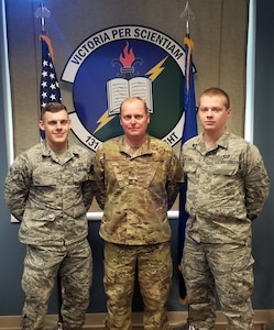 (Left to right) Airman 1st Class Garrett Starr, Iowa Air National Guard’s 132nd Operations Group, Master Sgt. J. Garrett Palmer, Florida ANG’s 131st Training Flight, and Airman 1st Class Phillip Turney, Texas ANG’s 209th Weather Flight, pose for a picture after winning the Thor’s Legion Forecast Challenge, an Air Force level competition that tests the forecasting capabilities of Airmen across the weather community.