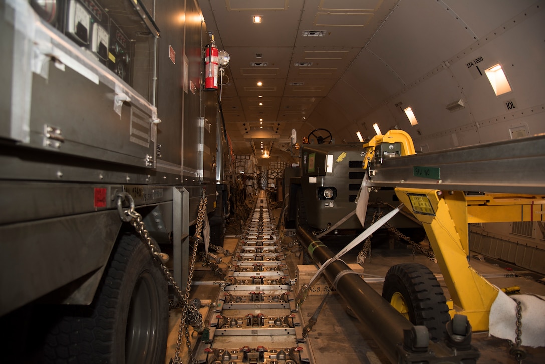 Cargo locked into place by the PACAF Air Mobility Command awaits transportation to RED FLAG-Alaska 19-2 at Misawa Air Base, Japan, May 25, 2019.  The supply logistics included both JASDF and U.S. Air Force personnel, coordinating more than 281,000 pounds of supplies. (U.S. Air Force photo by Branden Yamada)