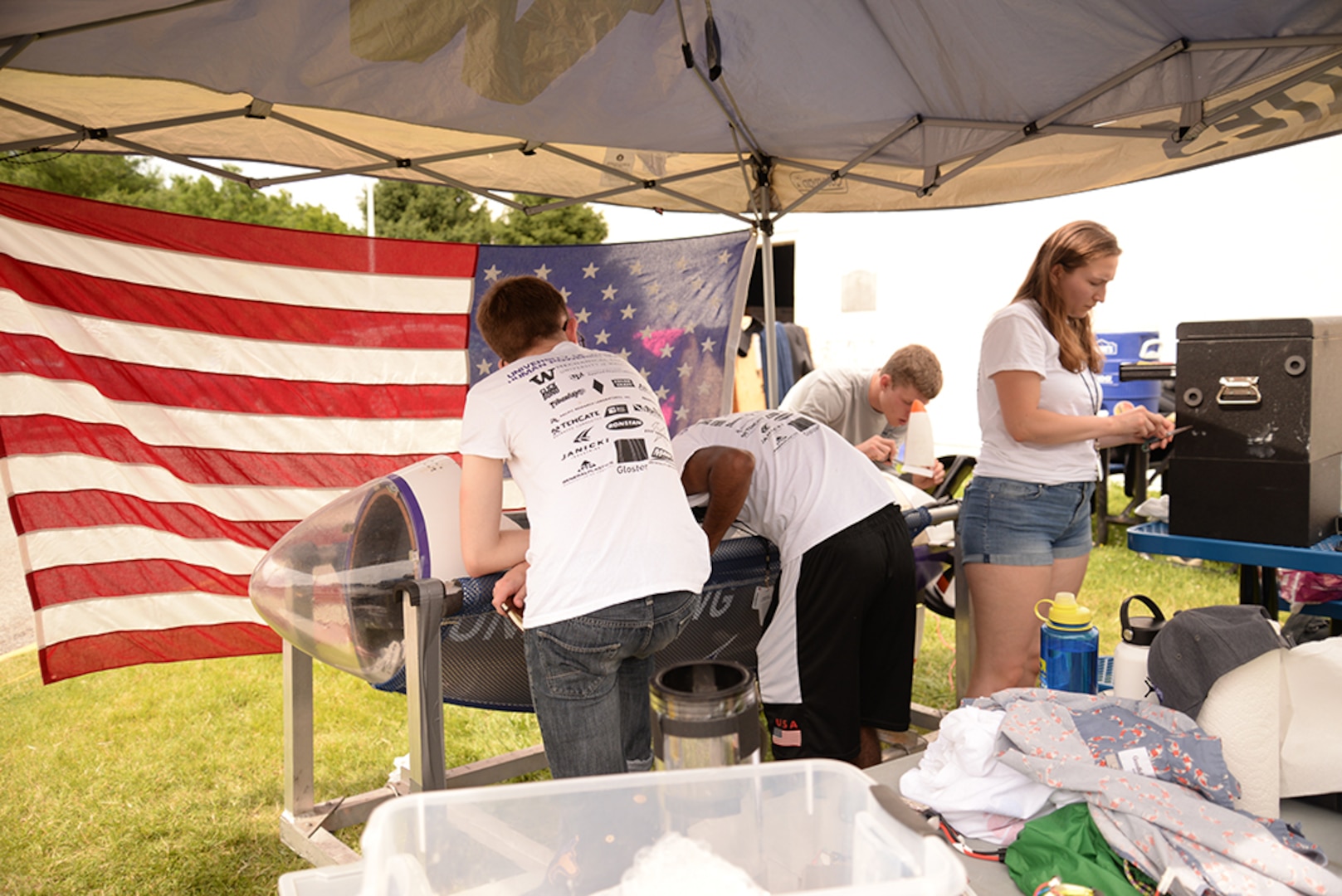 Washington’s Human-Powered Submarine team make adjustments to The Underdawg during the 15th International Human-Powered Submarine Races