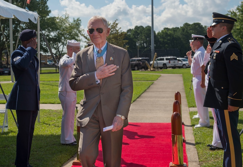Retired U.S. Marine Corps Maj. Gen. James Livingston, Medal of Honor recipient and guest speaker, arrives during a change of command ceremony June 28, 2019, Joint Base Charleston Naval Weapons Station, S.C. During the ceremony, Cmdr. Jack Garcia relieved Cmdr. Carl Brobst as commanding officer of Naval Consolidated (NAVCON) Brig Charleston. Garcia was previously the executive officer for NAVCON Brig Charleston. Brobst will be transferring Center for Surface Combat Systems Detachment, Mayport, Fla. NAVCON Brig Charleston’s mission is to ensure the security, good order and discipline, safety of adjudged and pretrial prisoners, and detain enemy combatants in accordance with guidance from the president through the secretary of defense. NAVCON Brig Charleston also aims to retrain and restore the maximum number of prisoners to honorable service and prepare members to be productive citizens outside of the military.