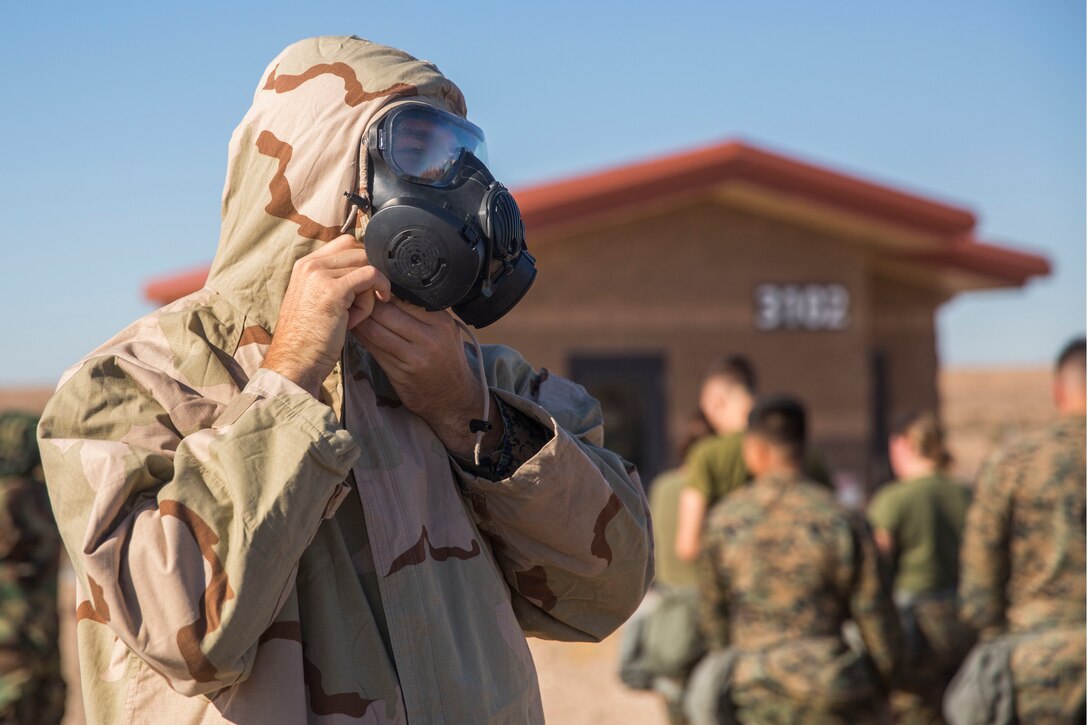 U.S. Marines stationed at Marine Corps Air Station (MCAS) Yuma conduct their Chemical, Biological, Radiological and Nuclear Defense (CBRN) training at the MCAS Yuma, Ariz. Gas Chamber, June 27, 2019. The gas chamber is a controlled environment in which a non-lethal gas is released, allowing Marines to test their issued gas masks and become familiar with the effects of gas. (U.S. Marine Corps photo by Cpl. Sabrina Candiaflores)