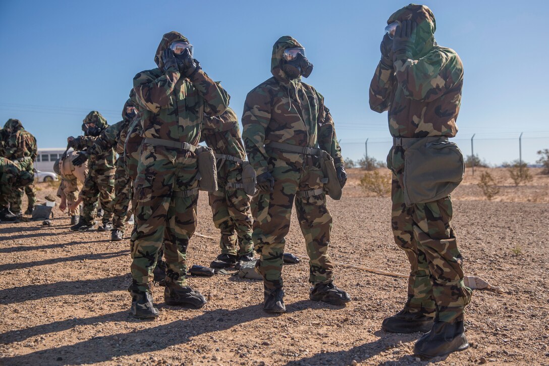 U.S. Marines stationed at Marine Corps Air Station (MCAS) Yuma conduct their Chemical, Biological, Radiological and Nuclear Defense (CBRN) training at the MCAS Yuma, Ariz. Gas Chamber, June 27, 2019. The gas chamber is a controlled environment in which a non-lethal gas is released, allowing Marines to test their issued gas masks and become familiar with the effects of gas. (U.S. Marine Corps photo by Cpl. Sabrina Candiaflores)