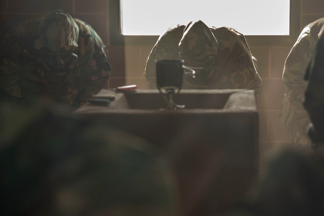 U.S. Marines stationed at Marine Corps Air Station (MCAS) Yuma conduct their Chemical, Biological, Radiological and Nuclear Defense (CBRN) training at the MCAS Yuma, Ariz. Gas Chamber, June 27, 2019. The gas chamber is a controlled environment in which a non-lethal gas is released, allowing Marines to test their issued gas masks and become familiar with the effects of gas. (U.S. Marine Corps photo by Cpl. Sabrina Candiaflores)
