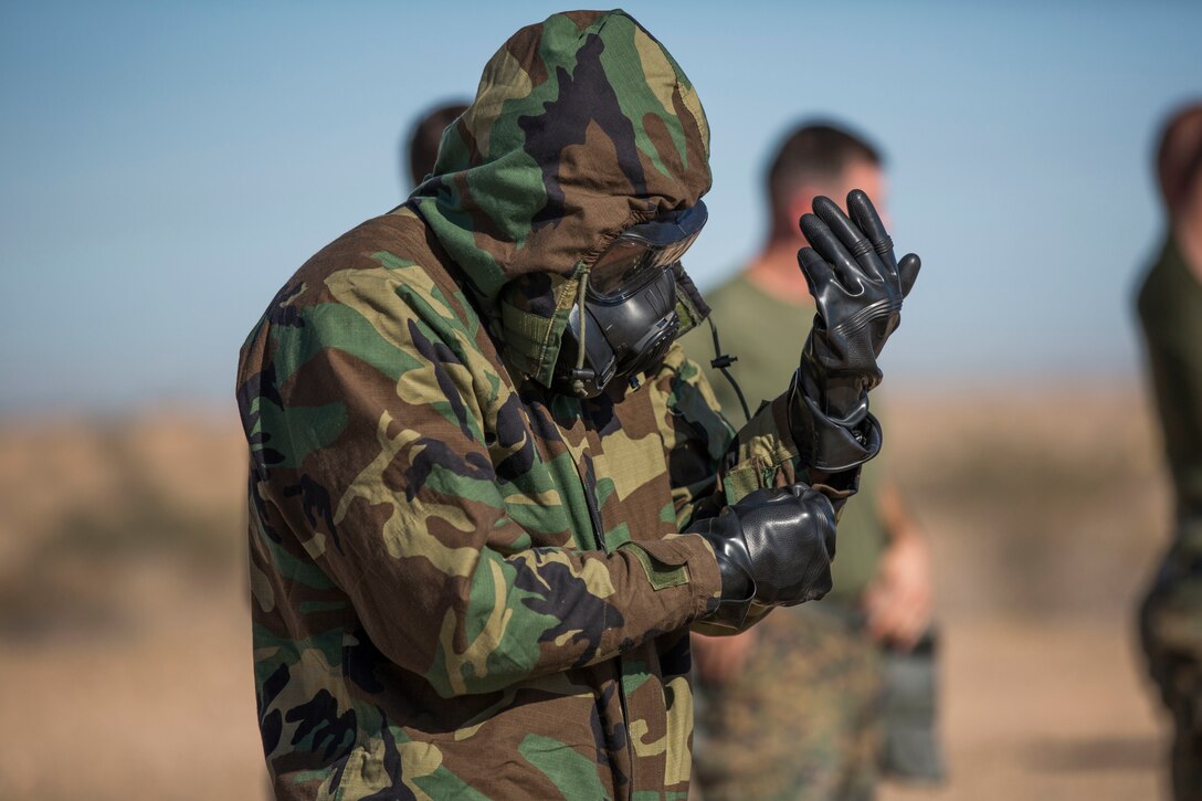 U.S. Marines stationed at Marine Corps Air Station (MCAS) Yuma conduct their Chemical, Biological, Radiological and Nuclear Defense (CBRN) training at the MCAS Yuma, Ariz. Gas Chamber, June 27, 2019. The gas chamber is a controlled environment in which a non-lethal gas is released, allowing Marines to test their issued gas masks and become familiar with the effects of gas. (U.S. Marine Corps photo by Cpl. Sabrina Candiaflores)