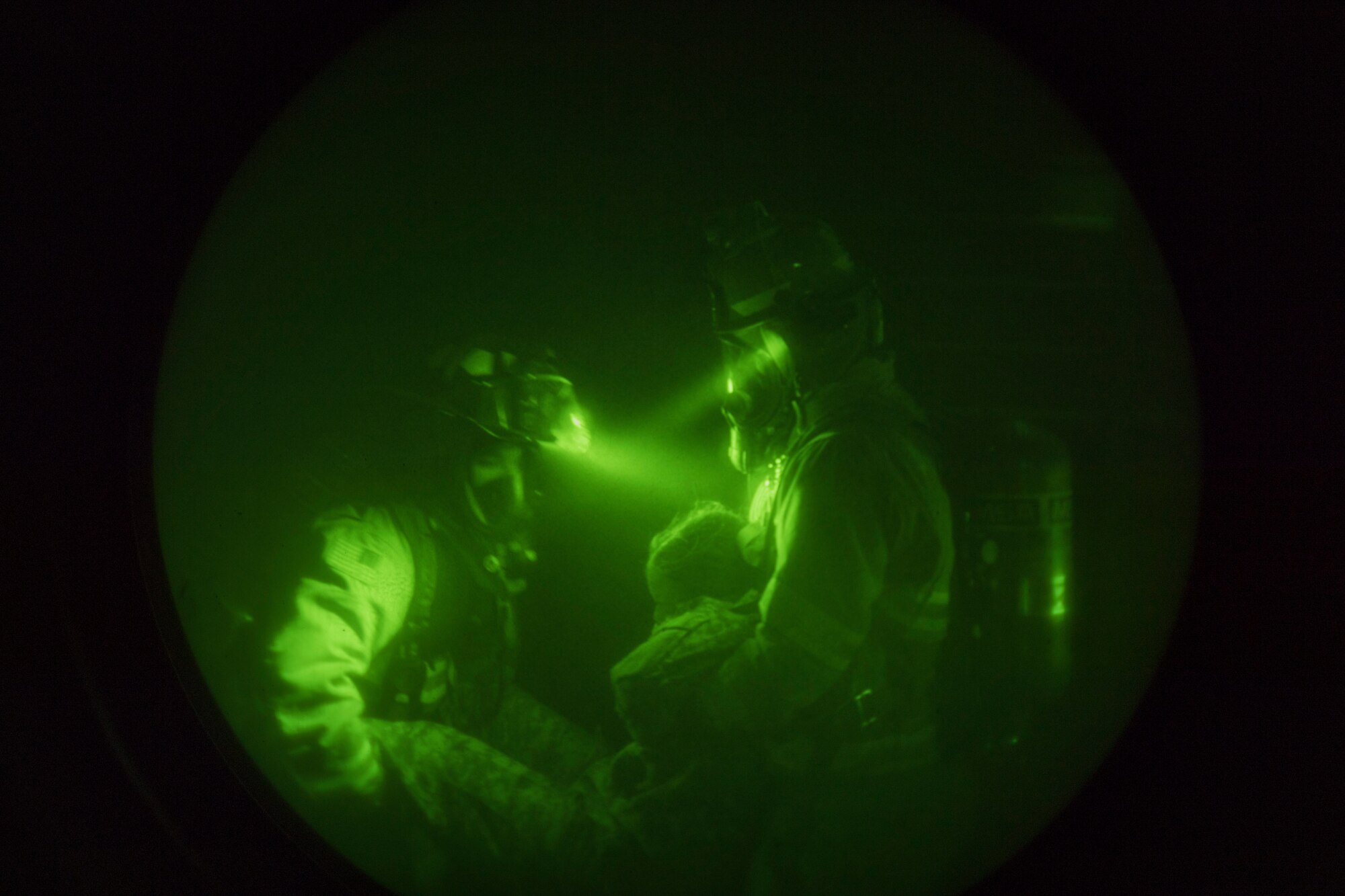 U.S. Air Force Firefighters from the 612th Air Base Squadron carry a patient from a smoke-filled building during a joint training exercise June 26, 2019, at Soto Cano Air Base, Honduras. Members from Joint Task Force – Bravo’s Medical Element, 612th Air Base Squadron firefighters and 480th Military Police Company worked together to accomplish goals during the training event. The event involved the firefighters entering a smoke-filled building to recover burn casualties while the Medical Element performed triage at the scene. The 480TH MPC members provided a cordon of the area and kept rioting personnel from entering the scene. (U.S. Air Force photo by Staff Sgt. Eric Summers Jr.)