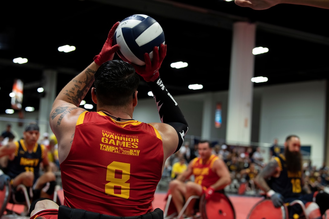 U.S. Marine Corps Staff Sgt. Jason Pacheco participates in the DoD Warrior Games Wheelchair Rugby competition in Tampa, Florida, June 27, 2019. DoD Warrior Games were established in 2010 as a way to enhance the recovery and rehabilitation of wounded, ill or injured service members and veterans and to expose them to adaptive sports.