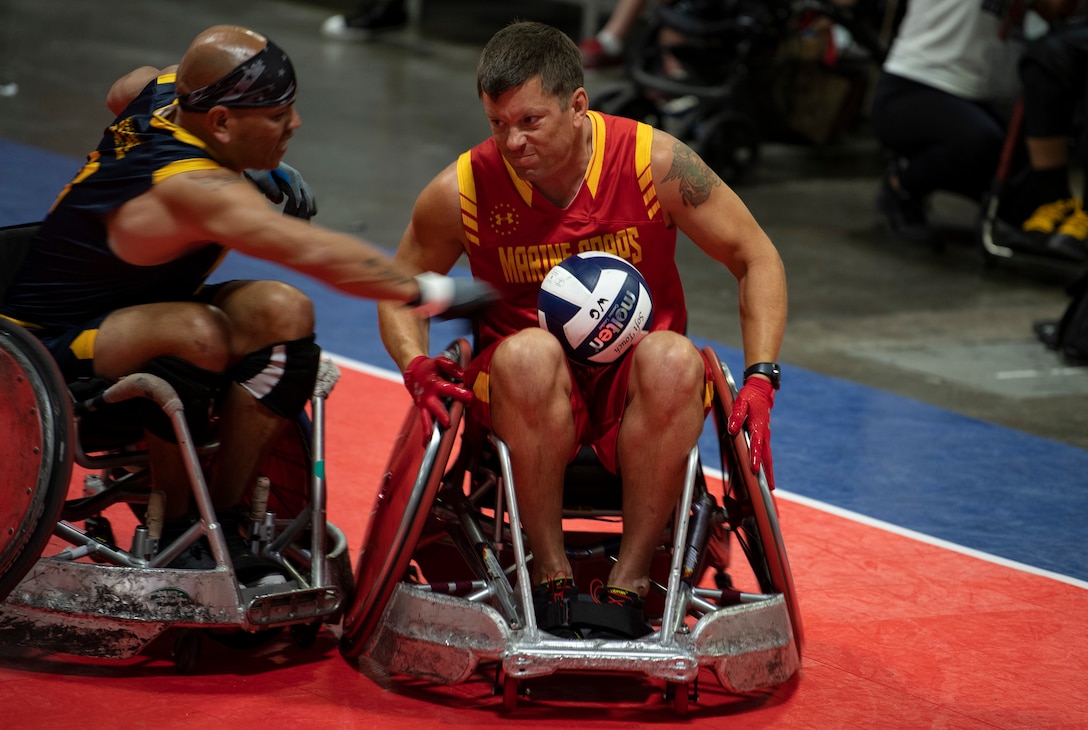 U.S. Marine Corps Staff Sgt. Jason Pritchett participates in the DoD Warrior Games Wheelchair Rugby competition in Tampa, Florida, June 27, 2019. The DoD Warrior Games is an adaptive sports competition for wounded, ill and injured service members and veterans. The 2019 Warrior Games consist of 13 Paralympic-style sports, and more than 300 athletes representing the U.S. Marine Corps, Army, Navy, Air Force, Special Operations Command, and five international teams.