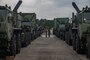 U.S. Marines with 2nd Transportation Support Battalion, Combat Logistics Regiment 2, 2nd Marine Logistics Group, clean the inside of vehicles while staged to be loaded on to the USNS Watkins during exercise Resolute Sun at Joint Base Charleston, South Carolina, June 11, 2019. Marines participated in the exercise to increase major combat operational readiness in amphibious and prepositioning operations while conducting joint training with the U.S. Army during a joint logistics over the shore scenario.