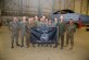 Brig. Gen. E. John Teichert, 412th Test Wing Commander, and Chief Master Sgt. Ian Eishen, 412th Test Wing Command Chief, pose for a photo with the 412th Maintenance Group Weapons Team at Edwards Air Force Base, California, June 18. (U.S. Air Force photo by Christopher Okula)