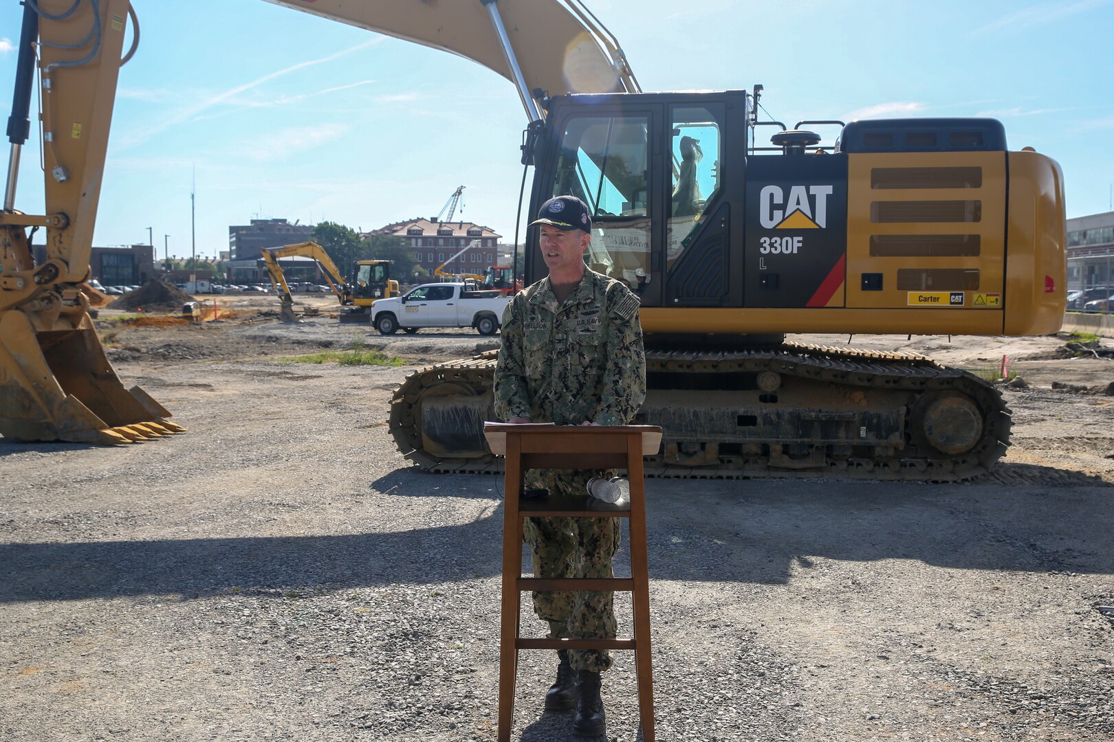 Norfolk Naval Shipyard (NNSY) Commander Captain Kai Torkelson provides remarks at the groundbreaking for NNSY’s new production training facility.  “In establishing this large, modern and consolidated training facility, we will provide a hub for the shipyard’s academic classrooms and on-the-job training areas, allowing theory and application to meet,” he said. “Innovation, collaboration and knowledge sharing will now transpire all under one roof, and streamlined to benefit our people.”